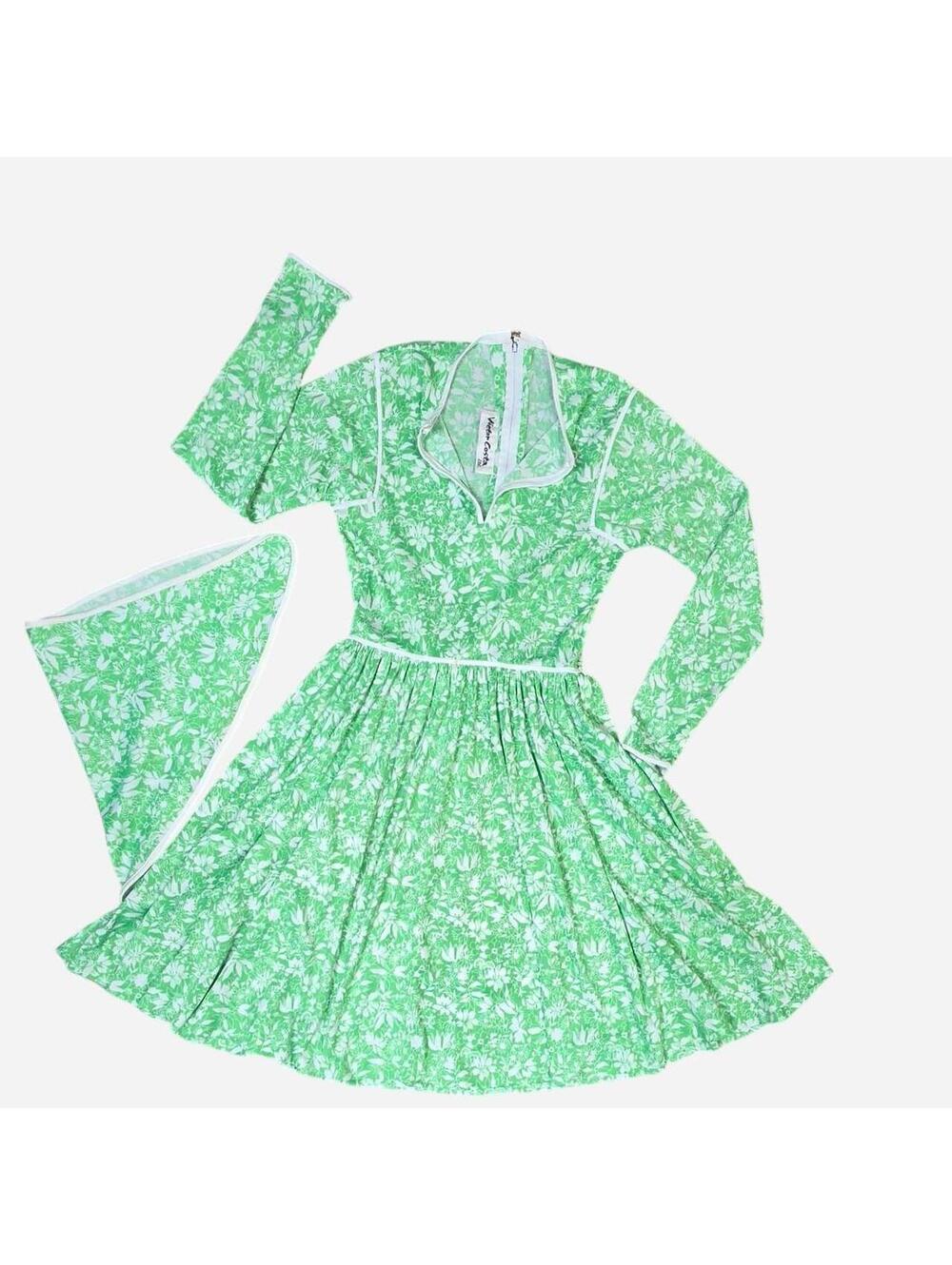 This is a vibrant vintage Victor Costa dress from the 1970s